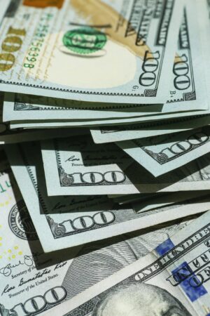 Pile of $100 Dollar Bills
