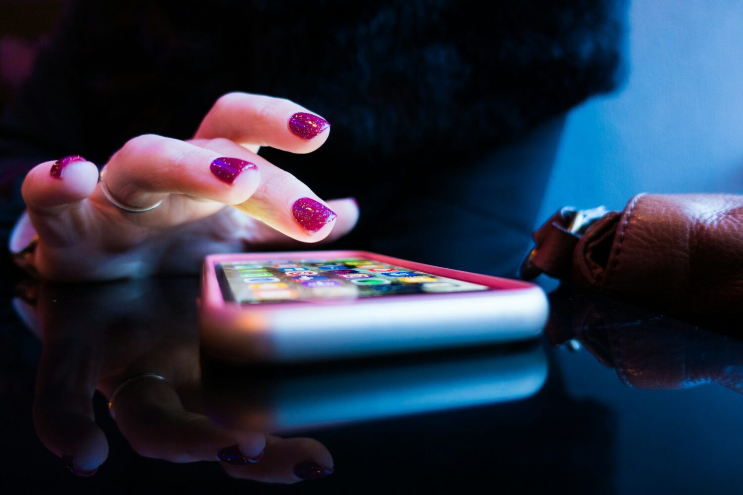 Female Hand Using Mobile